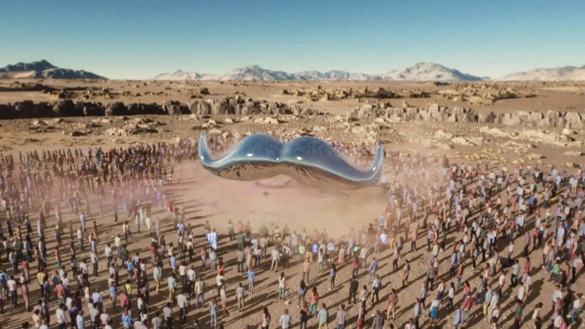Image of giant metallic moustache, descended from the sky, near an assembled throng of people.